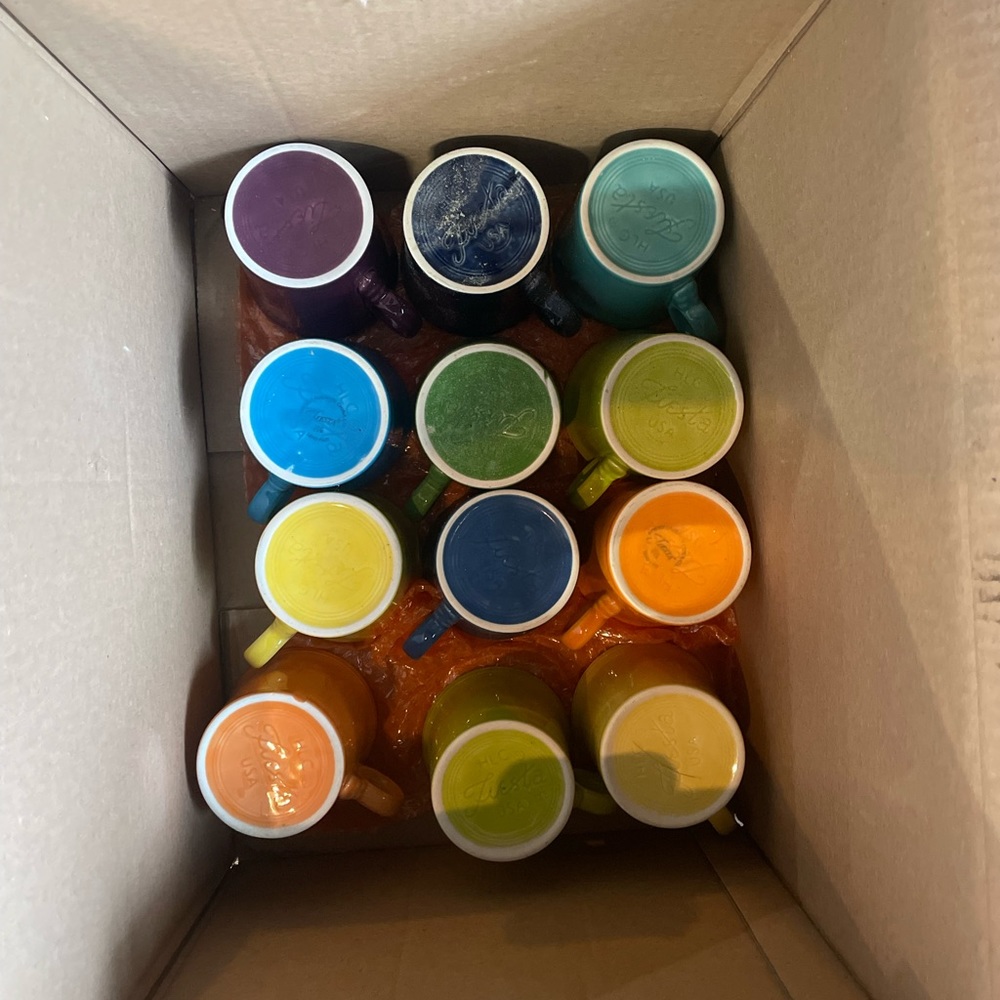Multiple colors of fiestaware mugs